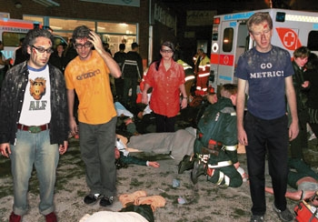Dazed record-store clerks stagger away from the scene of the roof collapse.